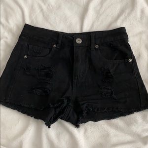 Black destructed high waist shorts